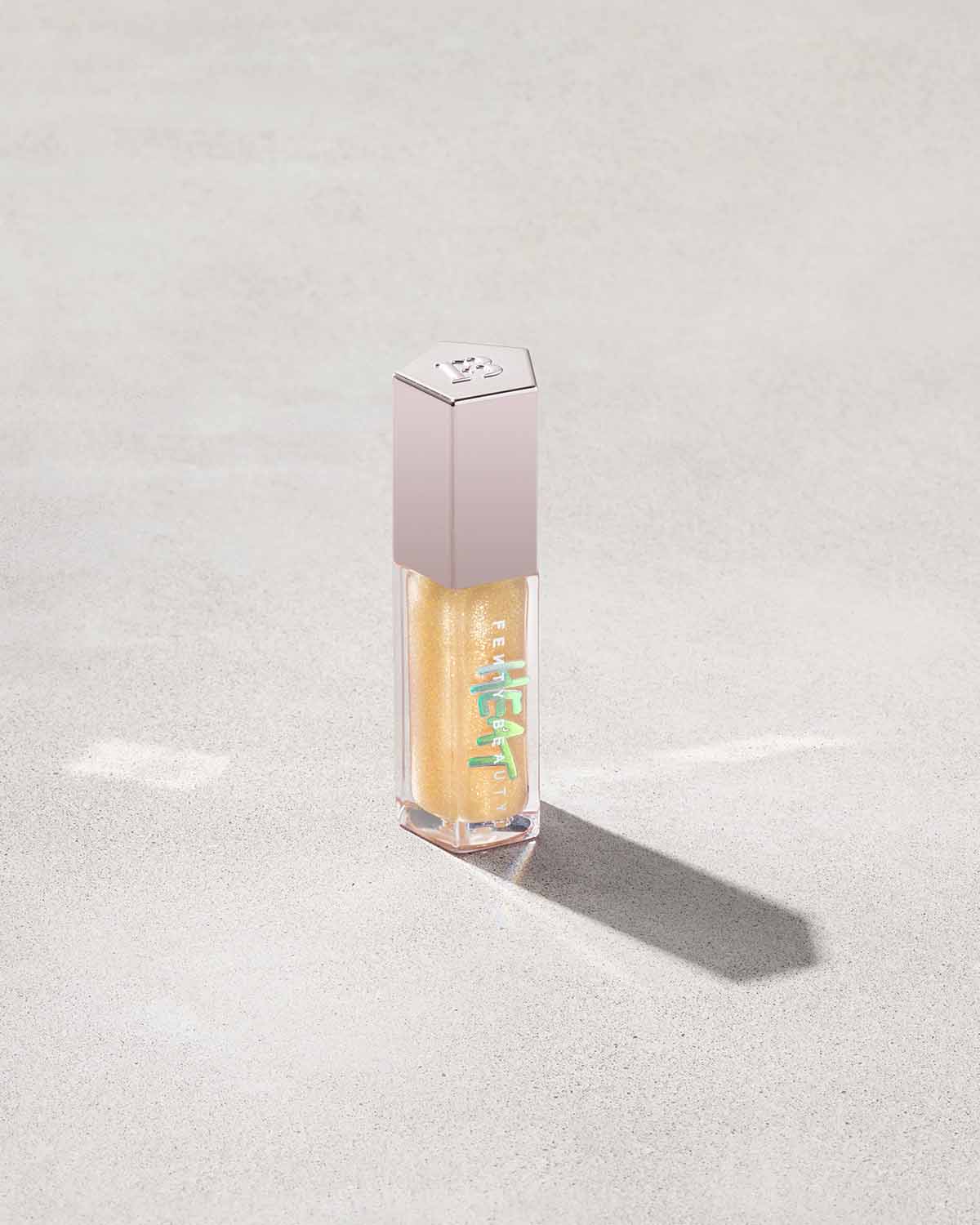 FB_HOL2021_I_T2PRODUCT_CONCRETE_GLOSS_BOMB_HEAT_CLOSED_LEMONLAVA_1200x1500_3241a64f-ebf2-4dce-ba26-4fcd6bf5e079.jpg Gloss Bomb Heat Universal Lip Luminizer + Plumper - Lemon Lava - Image 1