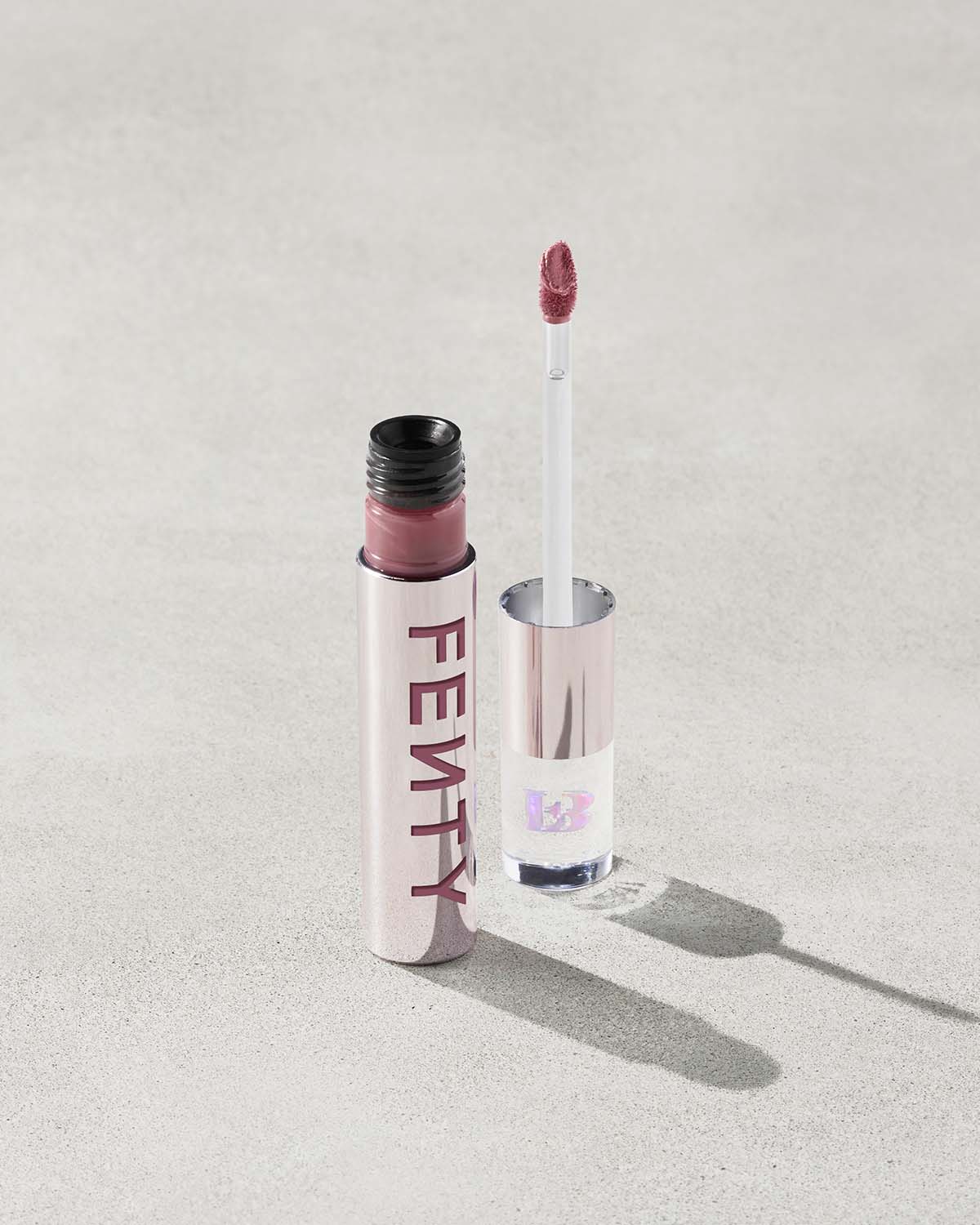 FB_POSTHOL22_T2PRODUCT_CONCRETE_FENTY_ICON_VELVET_LIQUID_LIP_OPEN_RIRI_1200x1500_d1ba70e7-6f74-42a0-b2fd-748f5efdca43.jpg Fenty Icon Velvet Liquid Lipstick - RiRi - Image 1